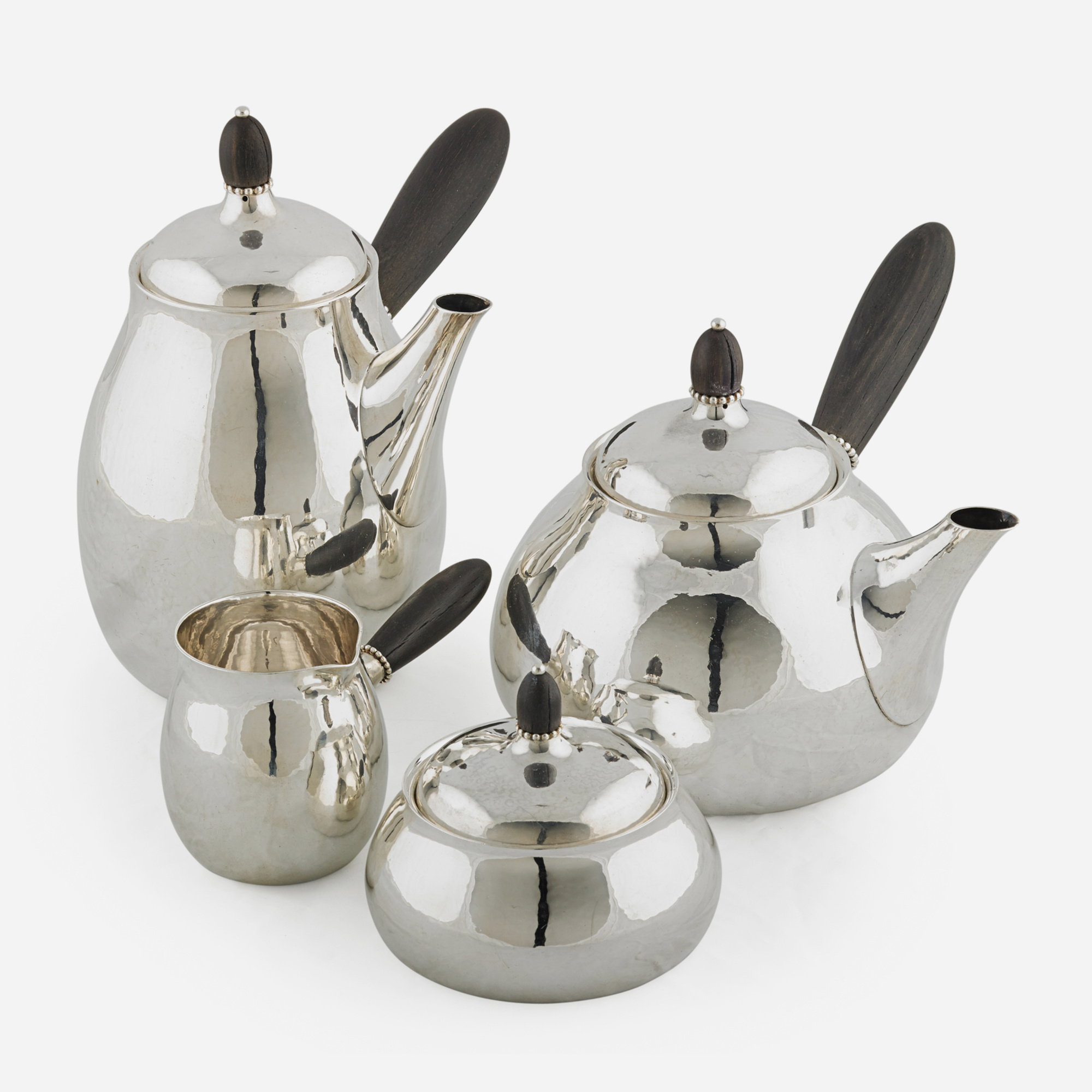 1311: GEORG JENSEN, Four-piece assembled tea and coffee set 