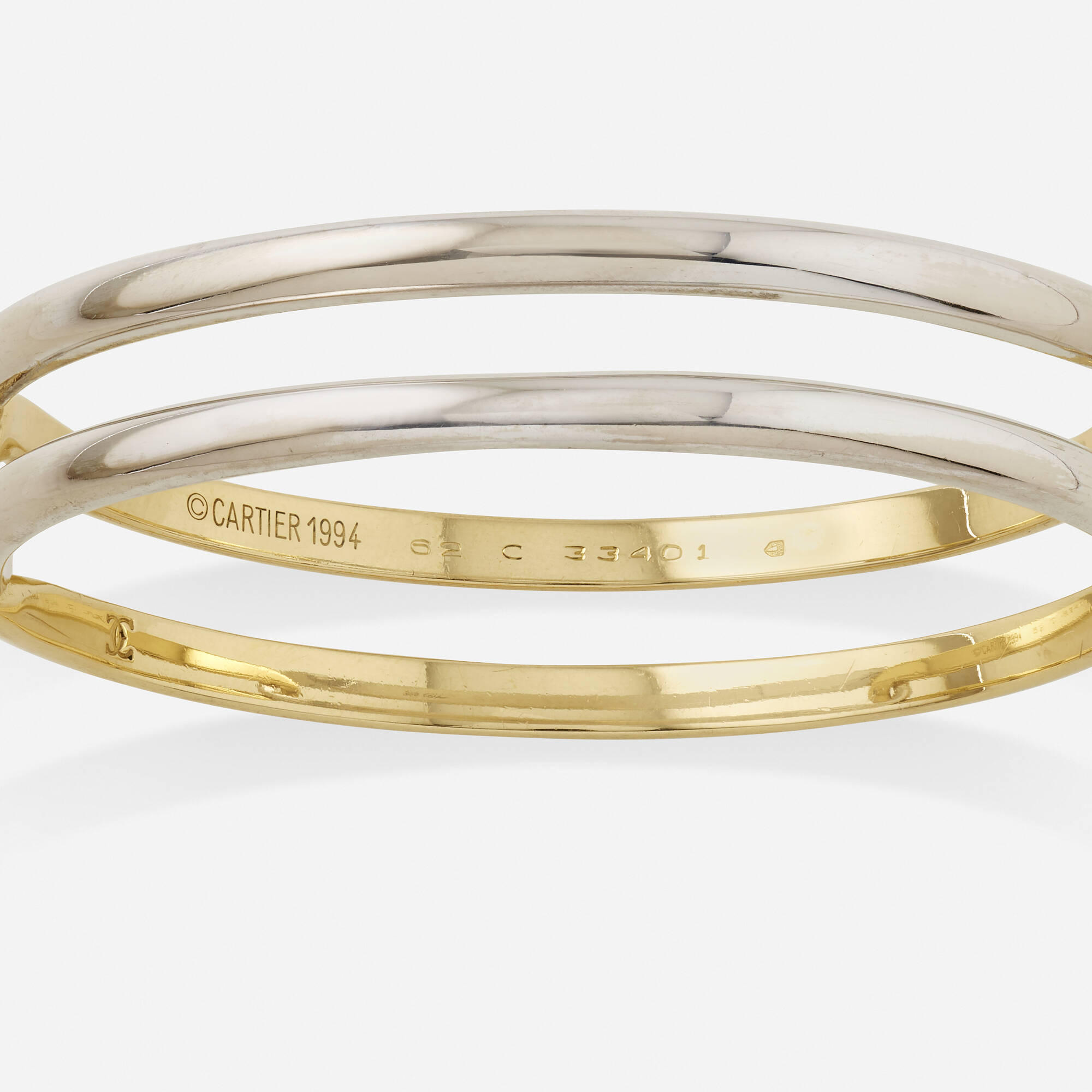152: CARTIER, Bicolor gold bangle bracelet < Jewels XOXO, 9 